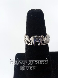 Elephants Holding Tails Ring